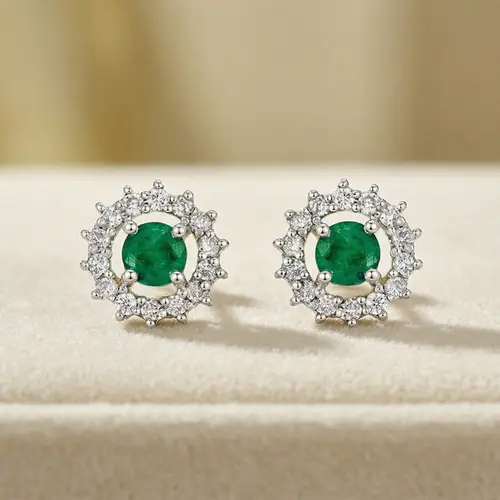 Par de Brincos de Ouro com 24 Diamantes e Esmeraldas com 30 Pts