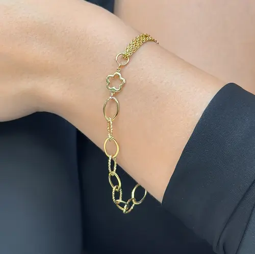 Pulseira de Ouro com Elos Ovais e Cartier e Estrela Vazada