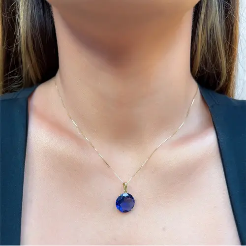 Pingente de Ouro redondo com Cristal de Tanzanita