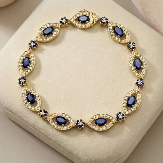 Pulseira de Ouro com 63 Safiras e 149 Diamantes