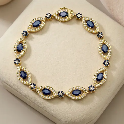 Pulseira de Ouro com 63 Safiras e 149 Diamantes