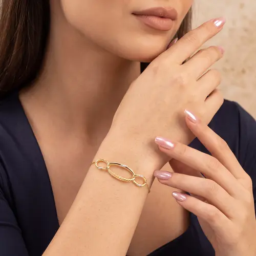 Pulseira de Ouro com Argolas ovais e 7 Diamantes