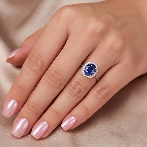 Anel de Ouro Branco com 22 Diamantes e Safira de 2,40 ct
