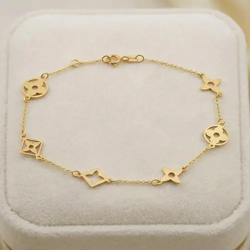 Pulseira de Ouro Amarelo com Berloques Florais