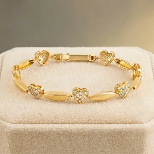Pulseira com Elos de Corações de Ouro Amarelo com 77 Diamantes