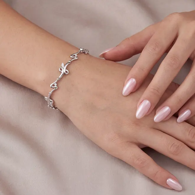 Pulseira Trabalhada de Ouro Branco com 10 Diamantes
