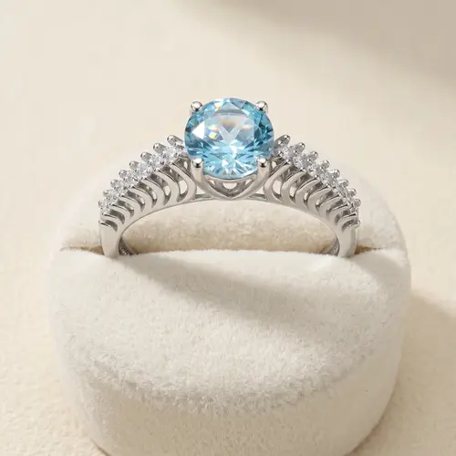 Anel modelo catedral de Ouro Branco com 14 Diamantes e Turmalina azul de 1,0 ct