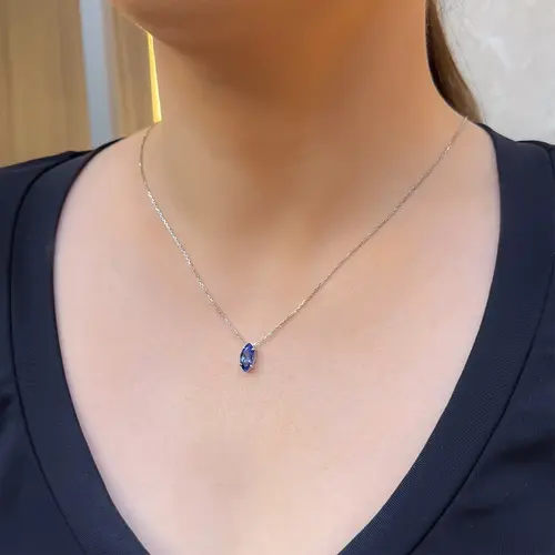 Pingente de Ouro Branco com Corrente e Tanzanita de 1,36 Cts.
