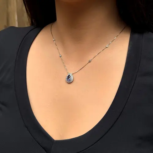 Pingente de Ouro Branco com Diamantes e Tanzanita de 1,55 Cts.