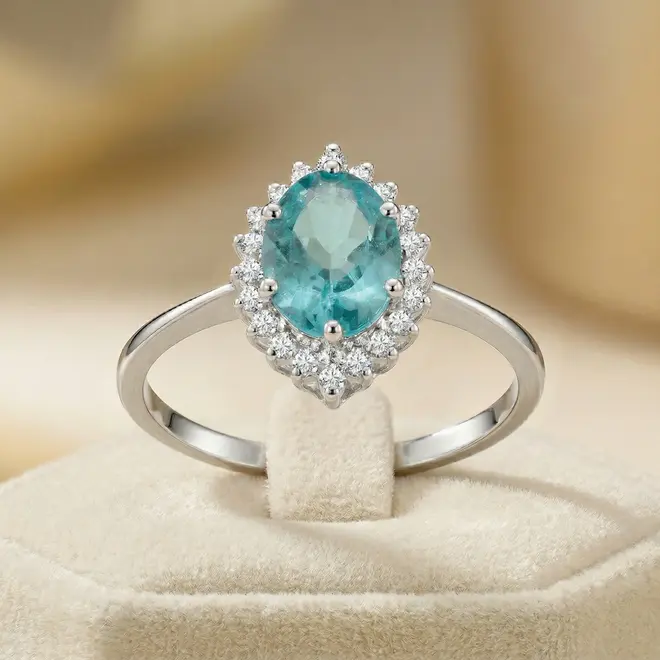 Anel de Ouro Branco com Diamantes e Apatita de 1,25 Cts.
