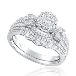 Conjunto Anel e Aparador de Ouro Branco com Diamantes totalizando 65 pts.