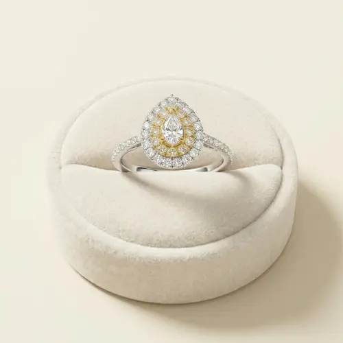Anel Gota Trabalhado de Ouro Branco com Diamantes Totalizando 1,0 Cts.