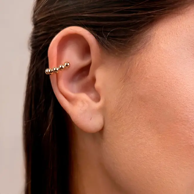 Pircing Trabalhado Meia Esfera em Ouro Amarelo.