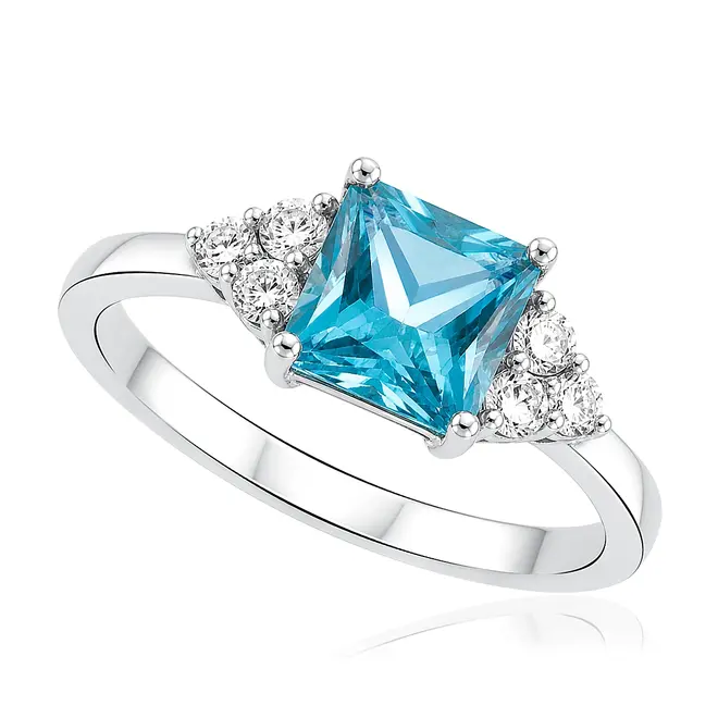 Anel Trabalhado de Prata com Diamantes e Cristal de Turmalina Azul.