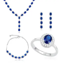 Conjunto Par de Brincos, Gargantilha e Pulseira e Anel de Prata com Cristais e Safiras Totalizando 55,0 Cts.
