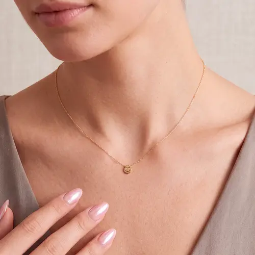 Pingente Menino, de Ouro Amarelo com 2 Diamantes