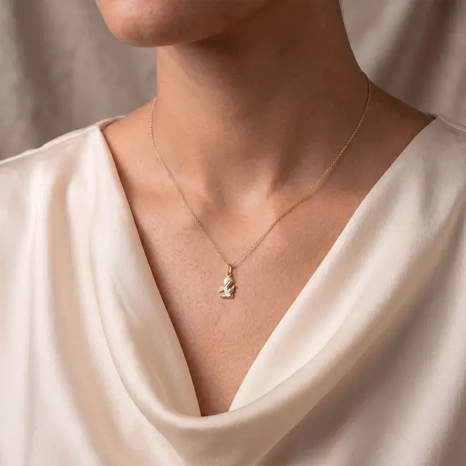 Pingente Anjo Prostrado em Ouro Amarelo 18K