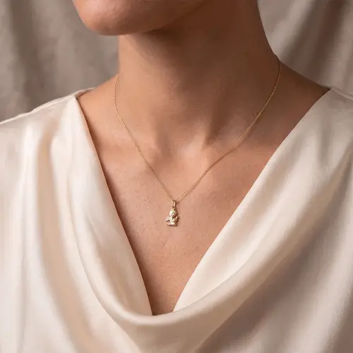 Pingente Anjo Prostrado em Ouro Amarelo 18K