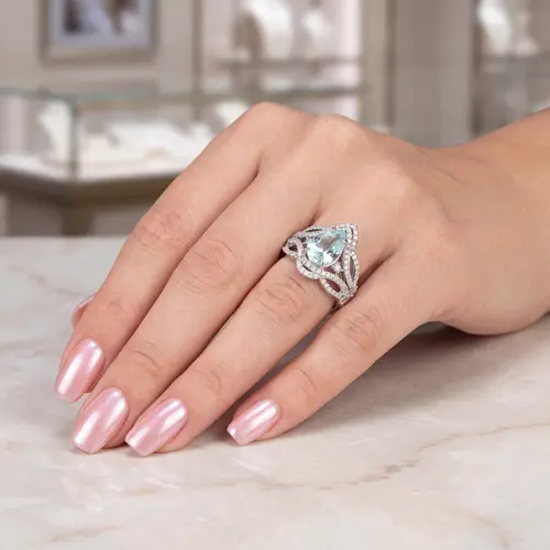 Anel de Ouro Branco com 115 Diamantes e Turmalina Paraíba de 2,40 Cts.