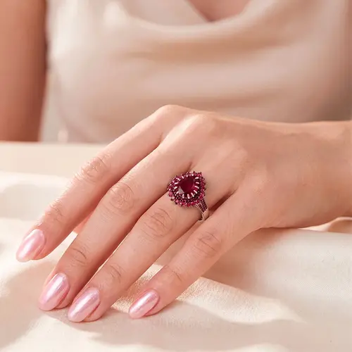 Anel Gota Trabalhado de Prata com Rubis. 125294
