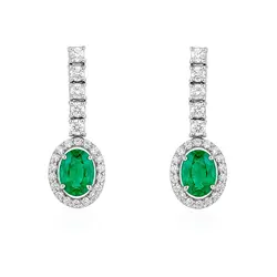 Par de Brincos Trabalhado de Ouro Branco com 46 Diamantes e Esmeraldas.
