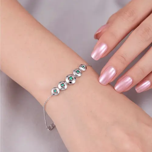 Pulseira de Ouro Branco com Esmeraldas
