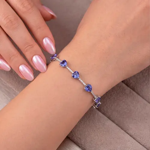 Pulseira de Ouro Branco com Diamantes e 11 Tanzanitas.