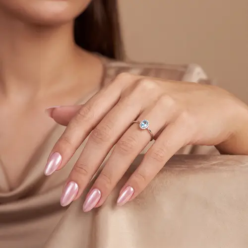 Anel de Ouro Branco com 14 Diamantes e Apatita de 47 Pts.